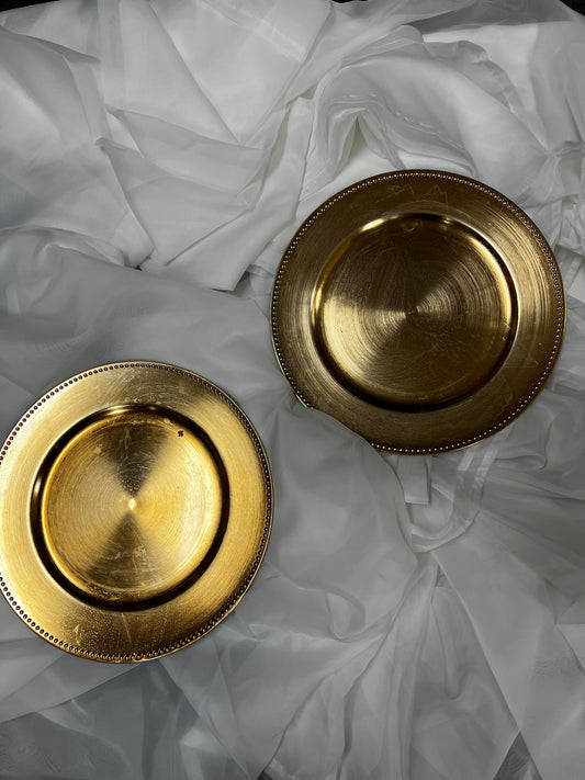 Gold Chargers. 9 boxes of 6 in good condition, plastic. 13" round