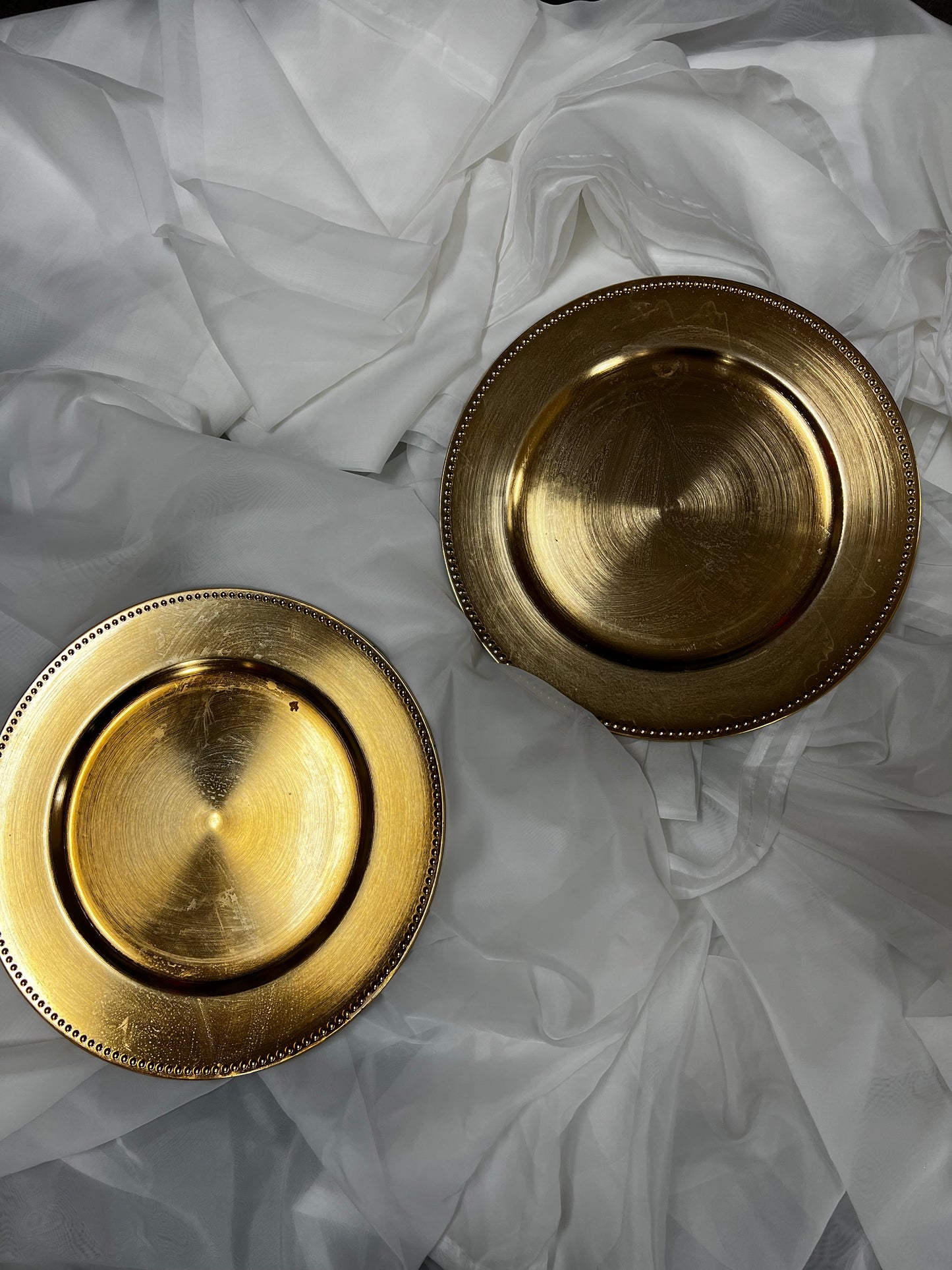 Gold Chargers. 9 boxes of 6 in good condition, plastic. 13" round