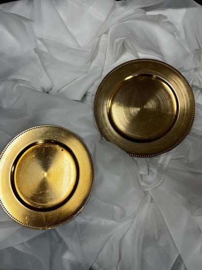 Gold Chargers. 9 boxes of 6 in good condition, plastic. 13" round