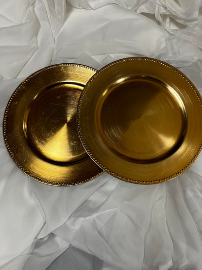 Gold Chargers. 9 boxes of 6 in good condition, plastic. 13" round