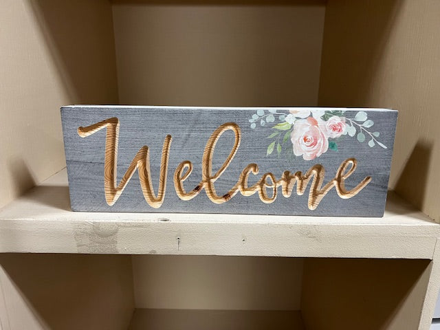 Wood welcome sign.